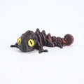 3D printed chameleon lizard with movable joints - a popular realistic pet model gift for kids, a funny toy, for sale at a stall.