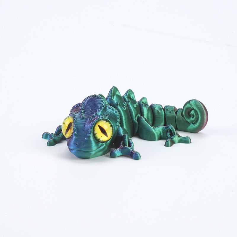 3D printed chameleon lizard with movable joints - a popular realistic pet model gift for kids, a funny toy, for sale at a stall.
