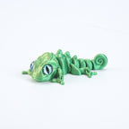 3D printed chameleon lizard with movable joints - a popular realistic pet model gift for kids, a funny toy, for sale at a stall.