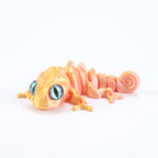 3D printed chameleon lizard with movable joints - a popular realistic pet model gift for kids, a funny toy, for sale at a stall.