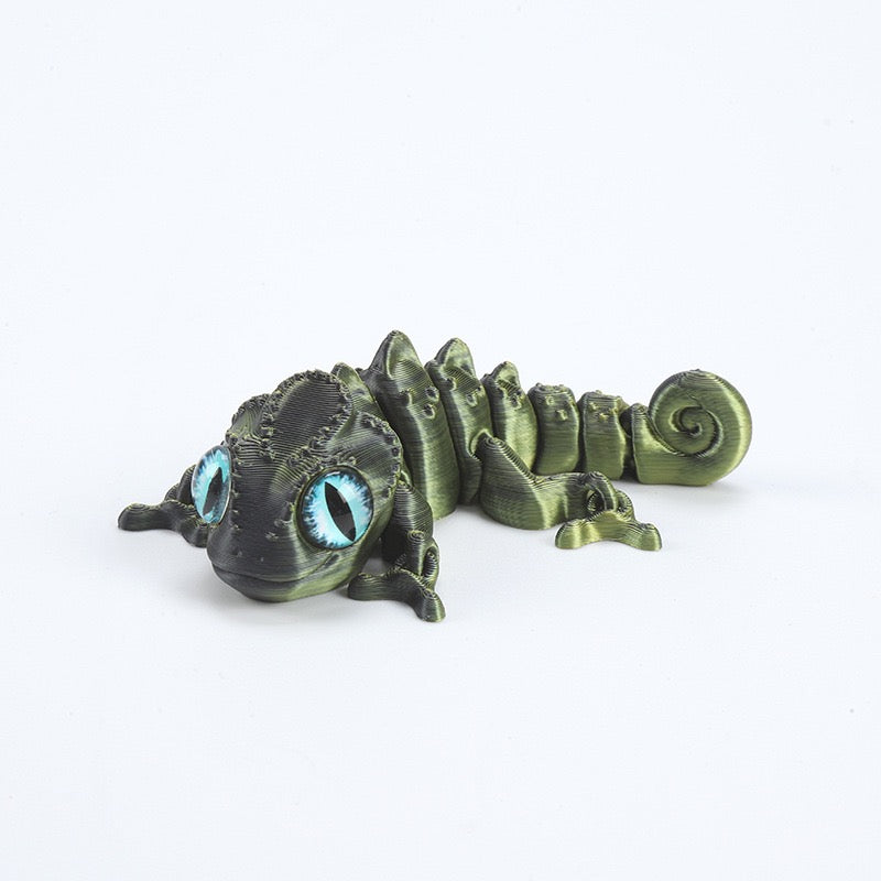 3D printed chameleon lizard with movable joints - a popular realistic pet model gift for kids, a funny toy, for sale at a stall.
