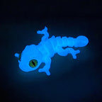 3D printed chameleon lizard with movable joints - a popular realistic pet model gift for kids, a funny toy, for sale at a stall.